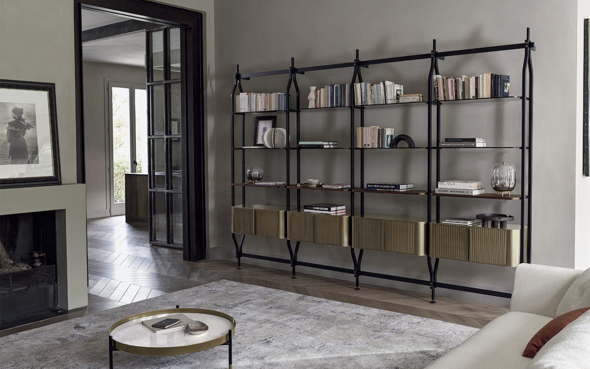 Charlotte modular bookcase — wall-fixed composition with open shelves and storage cabinets
