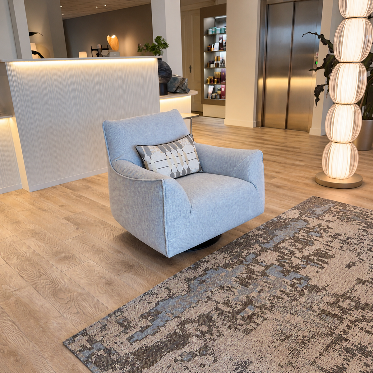 Natuzzi Italia Dolly swivel armchair — actual showroom photograph