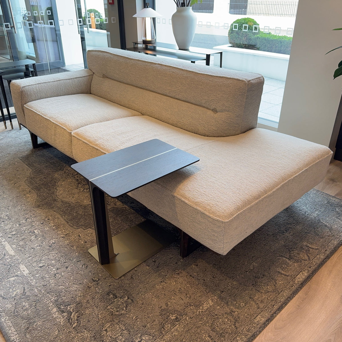 Natuzzi Italia Kendo chaise longue and side table set — actual showroom photograph