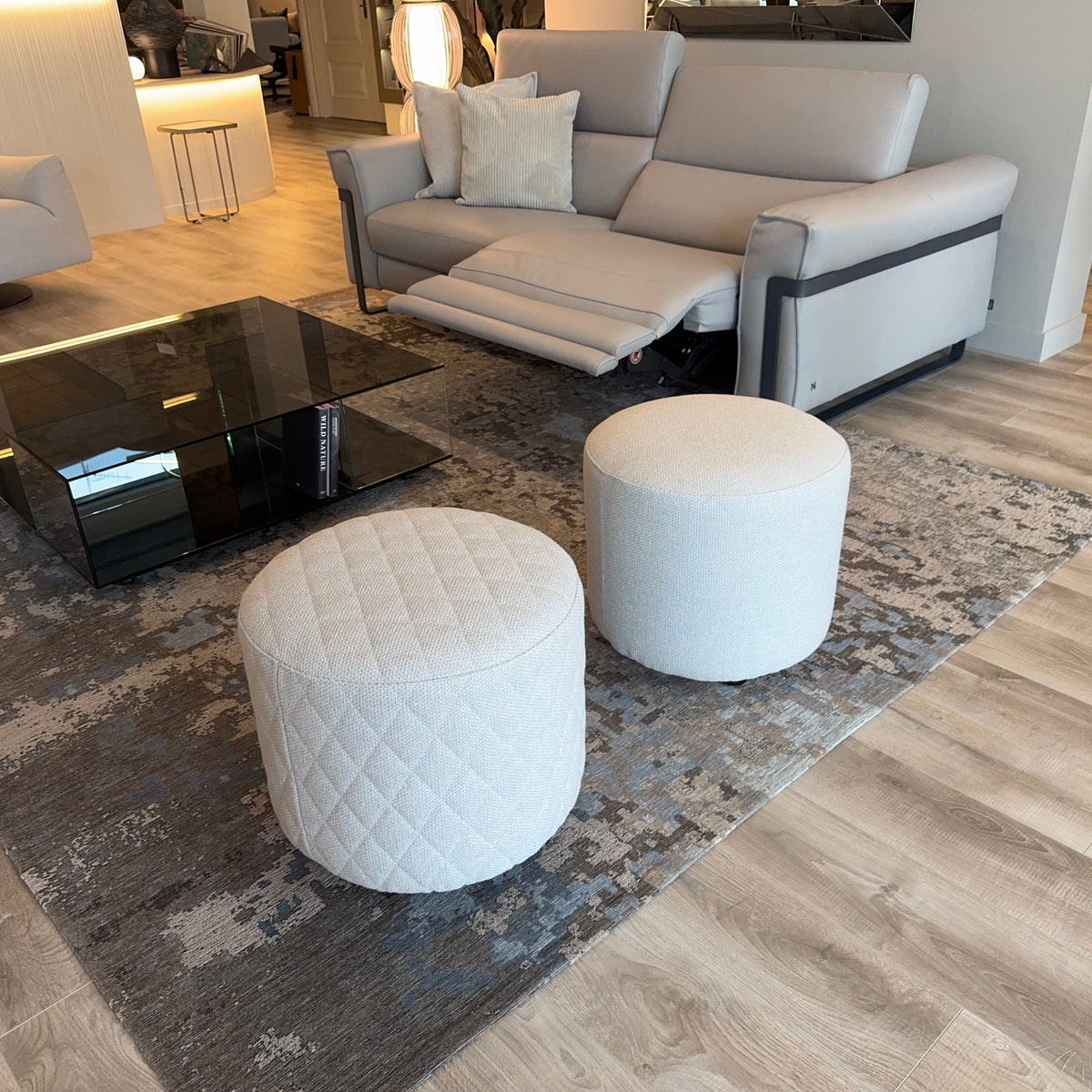 Natuzzi Italia Melpot round ottoman - Cold White — actual showroom photograph