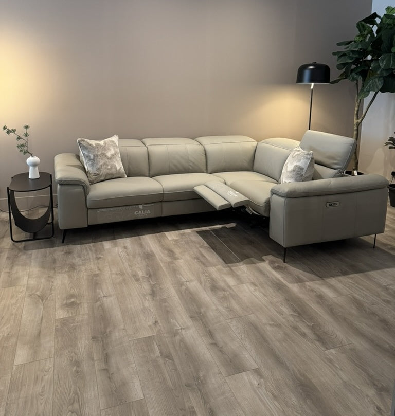 Calia Italia Panarea corner sofa in Tortora Bull leather — reclined