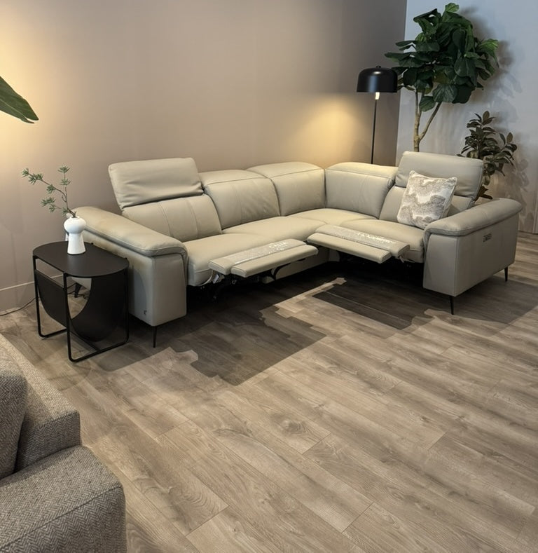 Calia Italia Panarea corner sofa in Tortora Bull leather — both reclined