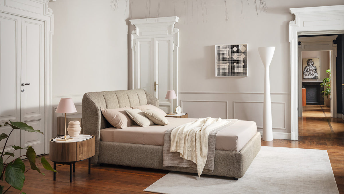 Calligaris Jill upholstered bed in a light, neutral bedroom