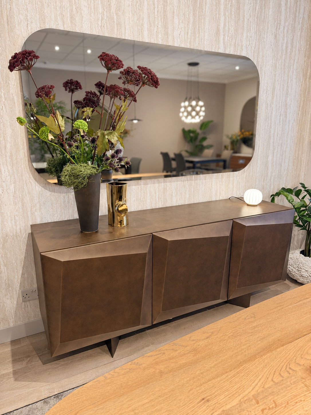 Actual three-door Alterego sideboard in brushed bronze at Fultons; mirror and accessories excluded.