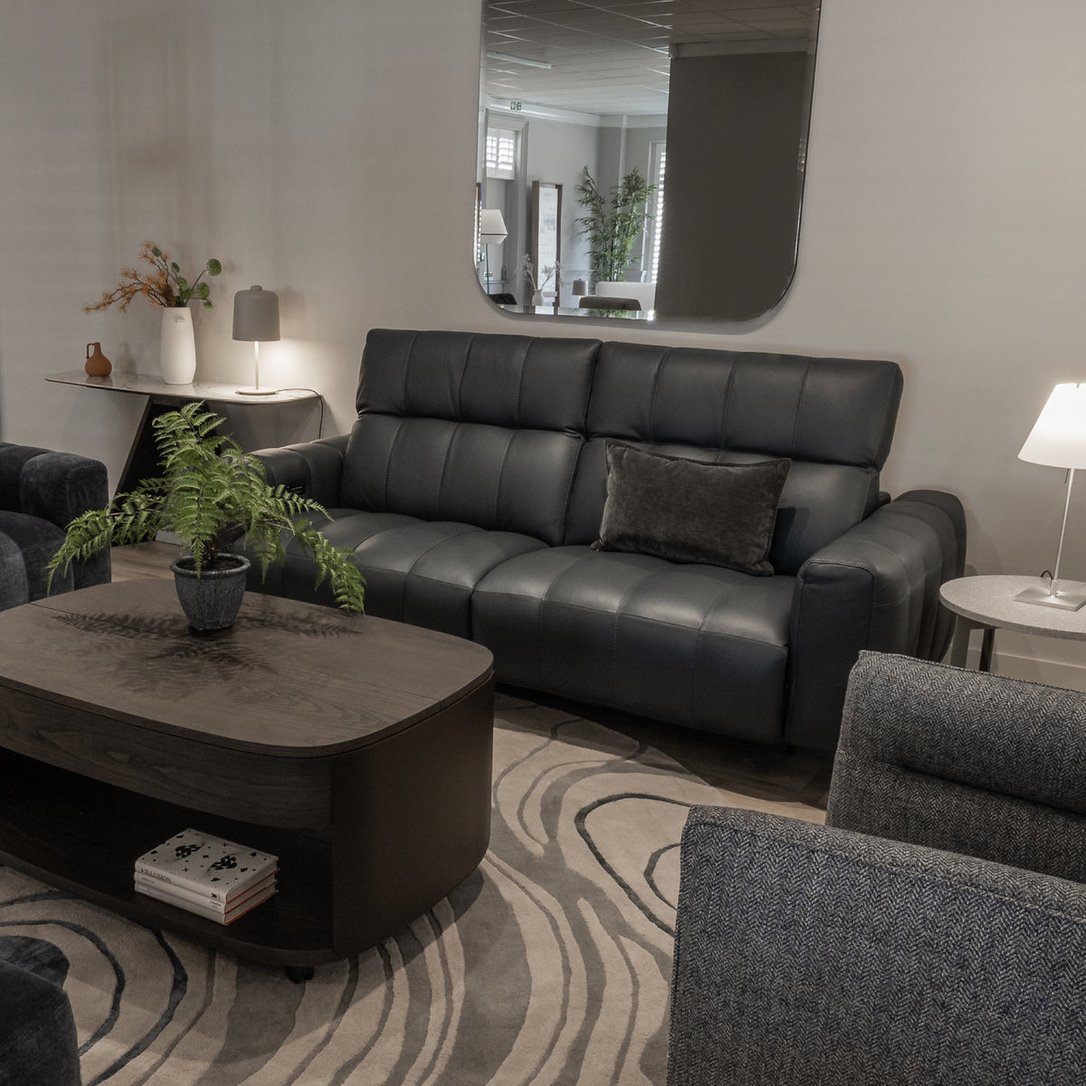 Natuzzi Editions Portento power sofa — Madison Blue Night leather — ex-display — original Fultons showroom photograph, square framing; other furniture and accessories excluded