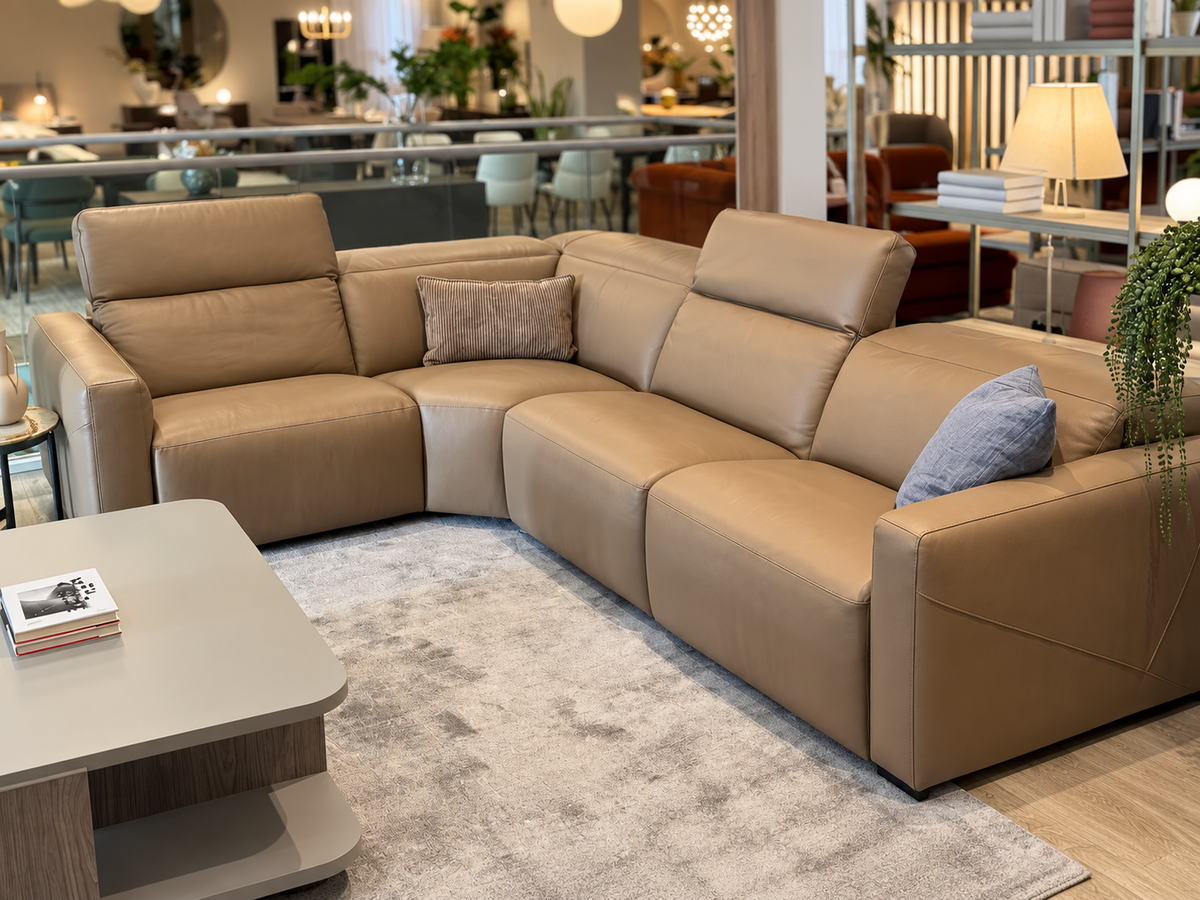 Natuzzi Editions Baltimora corner sofa in Leisure Alder leather — angled view of the four-piece group
