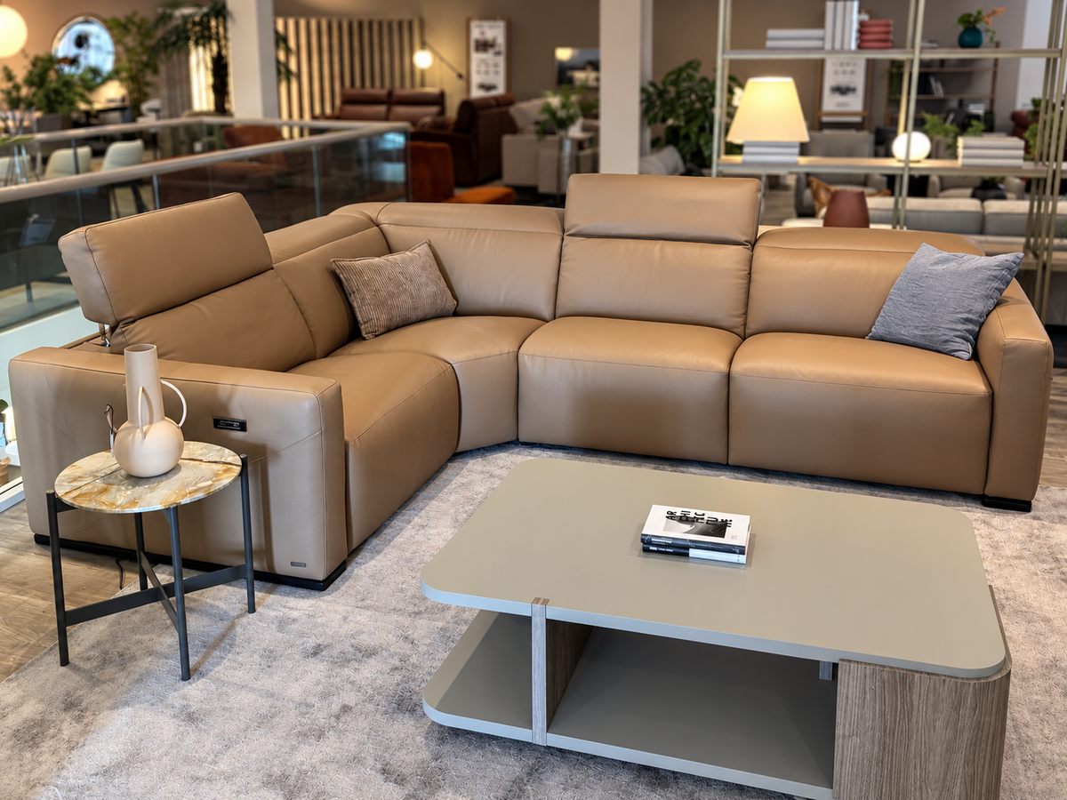 Natuzzi Editions Baltimora corner sofa in Leisure Alder leather — complete corner group in the showroom