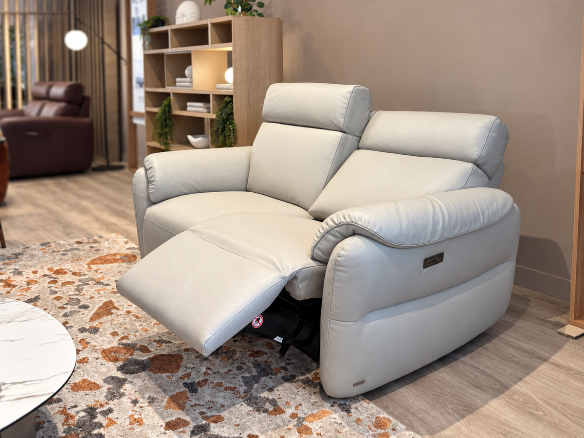 Natuzzi Editions Houston power sofa in Le Mans Light Grey leather, reclining seat extended, photographed in the Fultons showroom
