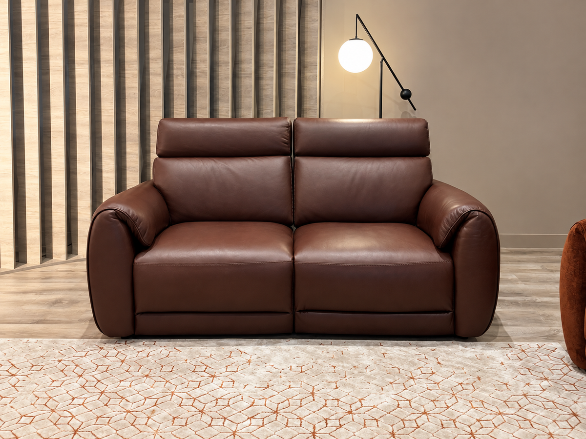Natuzzi Editions Nuvia power sofa in Dream Rawhide leather, front view, photographed in the Fultons showroom