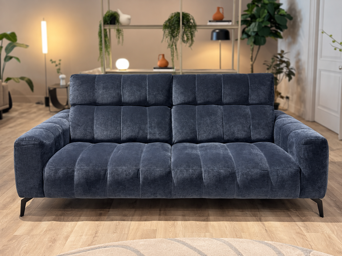 Natuzzi Editions Portento three-seater sofa in Cupido Midnight Blue fabric, front view, photographed in the Fultons showroom