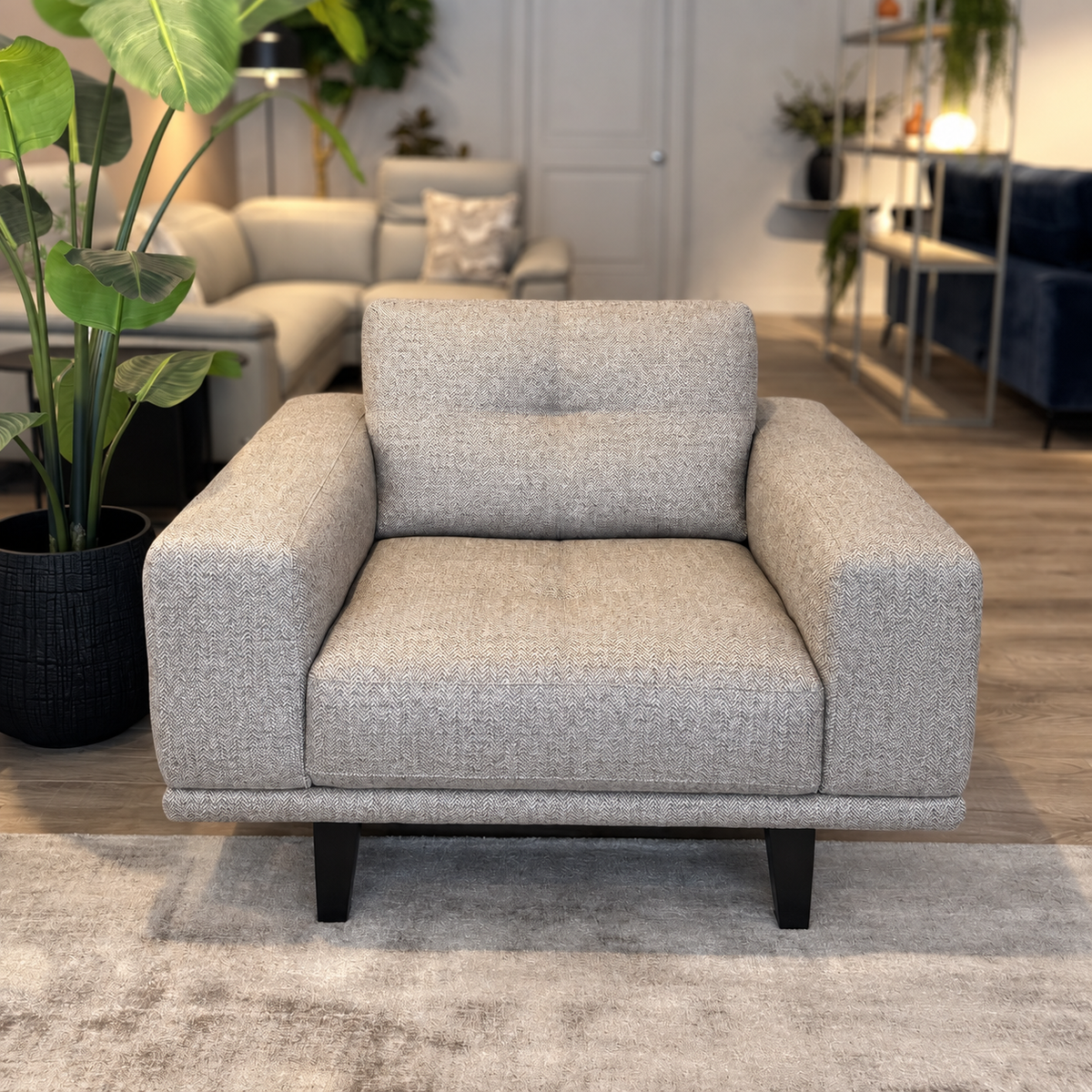 Natuzzi Editions Toledo armchair in beige melange fabric, photographed in the Fultons showroom