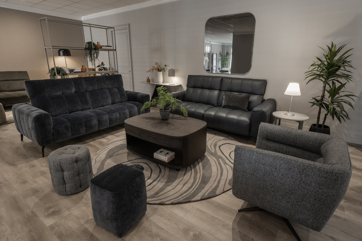 Fultons showroom with Portento fabric sofa on the left and Portento leather power sofa on the right; each sofa is offered separately.