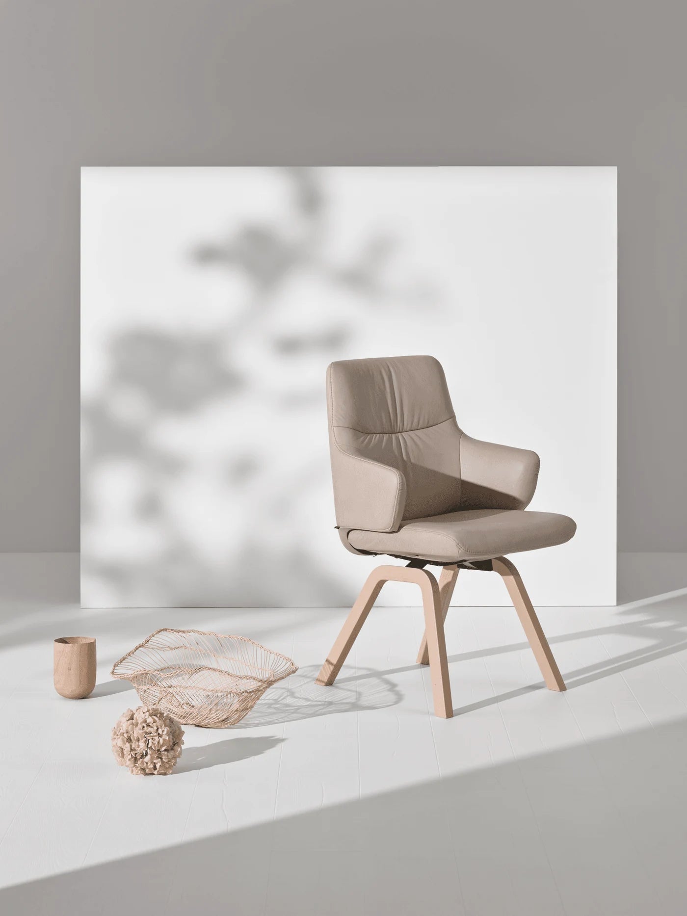 Stressless Mint low-back dining armchair in Paloma Fog leather with whitewashed D200 wood legs