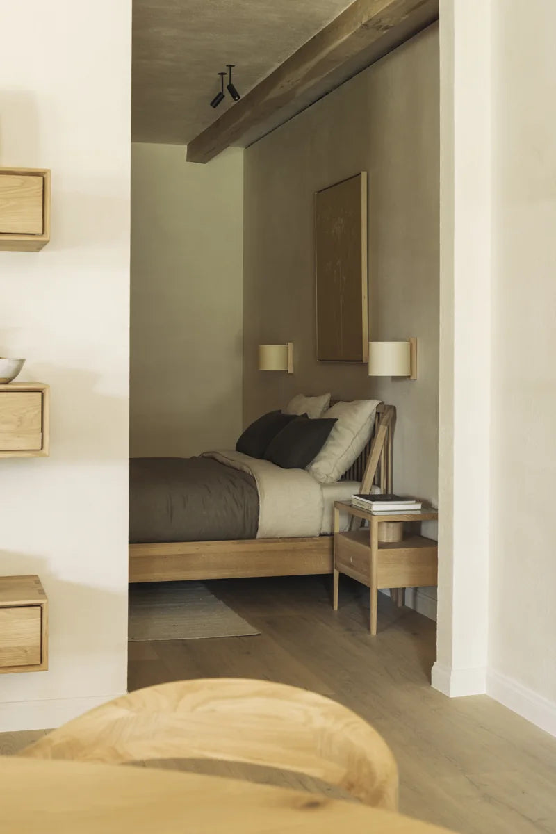 Ethnicraft Spindle in a warm bedroom setting