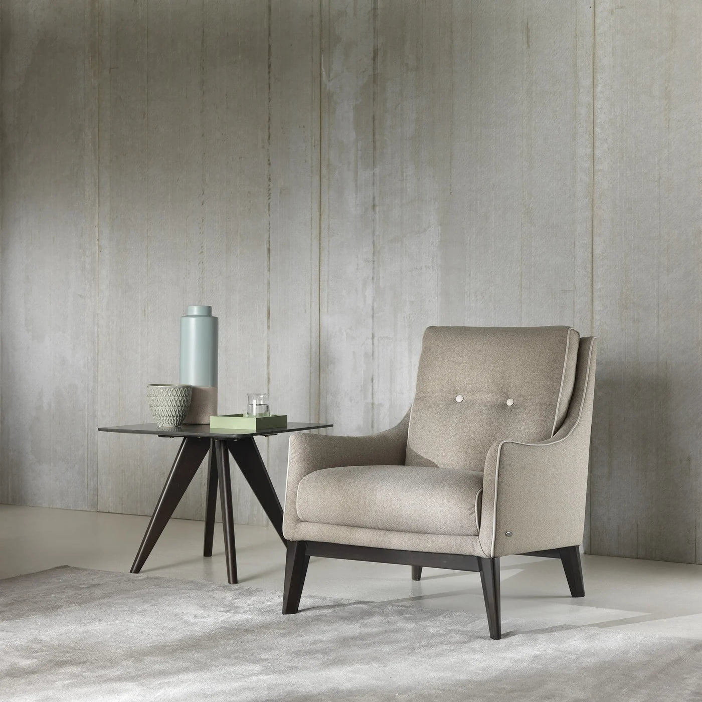 Natuzzi Editions Amicizia armchair in a neutral room setting